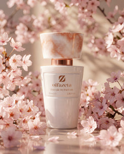 White bottle Olfazeta by Chogan Millésime N°40 surrounded by pink cherry blossoms, soft light