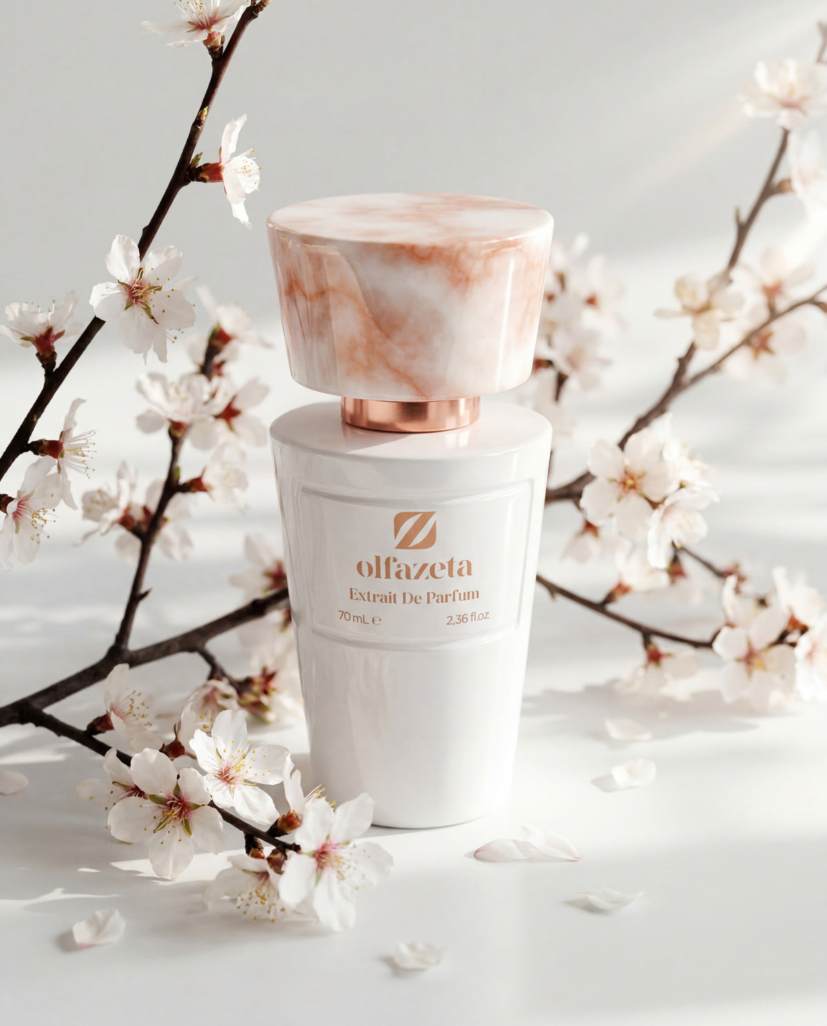 White bottle Olfazeta by Chogan Millésime N°81 among branches of white and pink cherry blossom