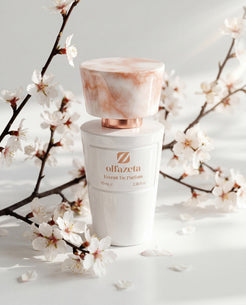 White bottle Olfazeta by Chogan Millésime N°81 among branches of white and pink cherry blossom